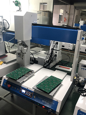 Un bon prix. Machine de soudage automatique de PCB à double table de 250x300 mm 0,5S par point en ligne